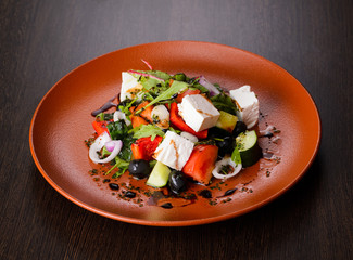 Vegetable salad on plate, view from above