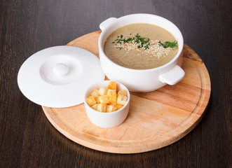 Cream soup on plate, view from above