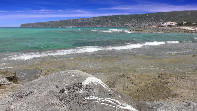 Balearic Ibiza Formentera turquoise beach with very small waves, 4 K video