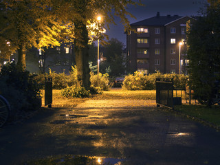 Suburban area during evening/night-time. Dark setting with some lights - 163008444