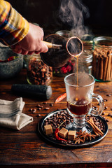 Obraz premium Man Pour Coffee in Mug.