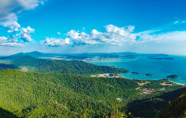 Fototapeta na wymiar Panoramic view of blue sky, sea and mountain seen from Cable Car viewpoint, Langkawi Island, Malaysia.