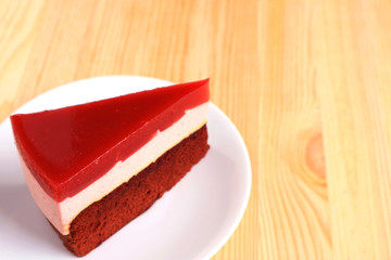 Raspberry Mousse with Chocolate Sponge Layer Cake Served on the Table, with Free Space for Text and Design 