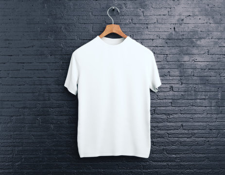 White t-shirt on brick background