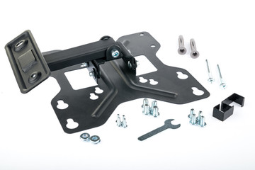 Black bracket, in the form of a butterfly, for a TV with accessories, on a white isolated background. Horizontal frame