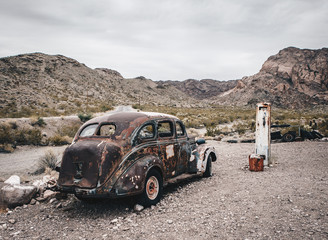 Old vintage car truck abandoned in the desert