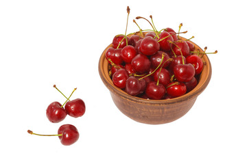 cherries in the bowl isolated on white