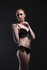 Fototapeta premium Sexy girl in underwear posing in studio