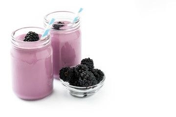 Fototapeta na wymiar Healthy blackberry smoothie in glass isolated on white background 