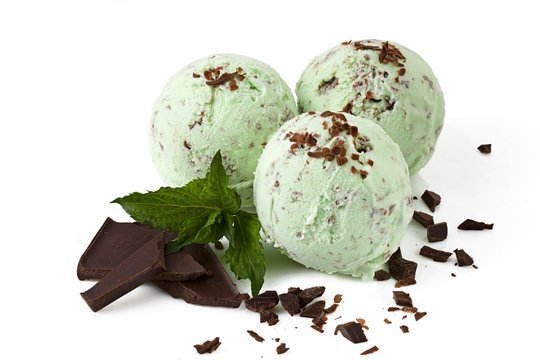Three scoops of mint ice cream with chocolate crumbs isolated with clipping path