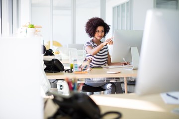 Female executive working at her desk