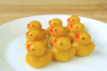 Kanom-Look-Choup, Thai Traditional Mung Beans Baby Ducks Shaped Marzipan Sweets Served on White Plate 