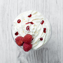 Shake in a glass with syrup