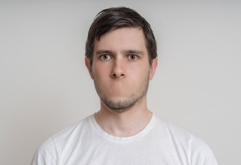 Face of young man without mouth. Censorship concept.