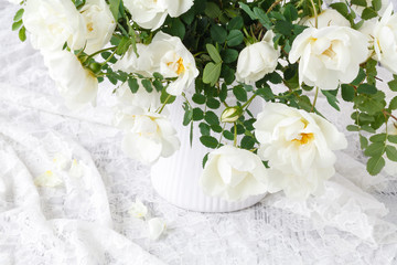 Obraz na płótnie Canvas bouquet of beautiful wild roses on white background