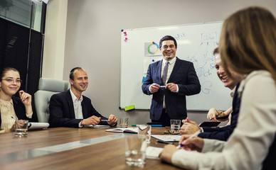 Business People Meeting Conference Discussion Corporate Concept,business team,business partners discussing documents and ideas,Business conference in a modern office,close up