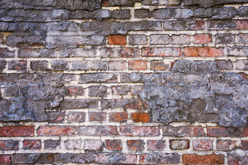 verwitterte Ziegelsteinmauer 