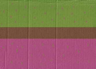 Fototapeta premium Green and pink background on cardboard