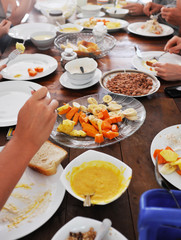 Top view of plates with different food on the table