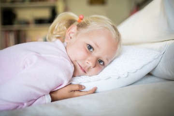 Girl relaxing in the bedroom