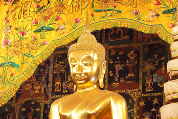 golden buddha statue with tradition chinese painting