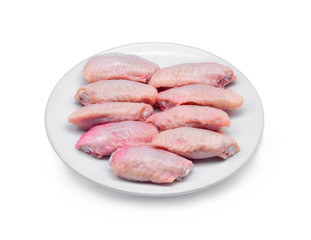 Fresh chicken wings on a white plate