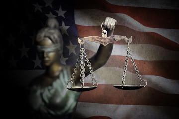 Lady Justice on U.S flag background