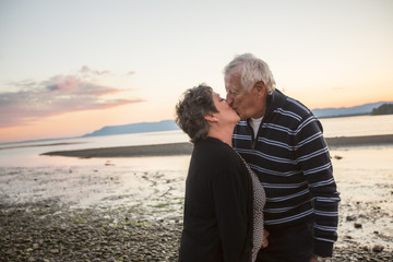 Portrait of loving senior couple at the beach