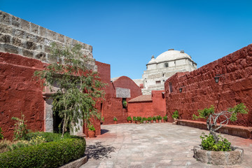 Santa Catalina Monastery with a religious quote on the wall - Arequipa, Peru