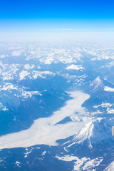 Obraz premium Snow Alps - aerial view from window of airplane