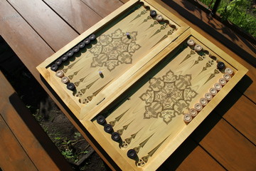Backgammon is another ancient game, which is great develops logical thinking skills.