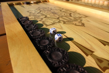 Backgammon is another ancient game, which is great develops logical thinking skills.
