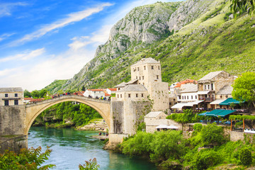 Fototapeta na wymiar Beautiful view Old bridge in Mostar, Bosnia and Herzegovina, on a sunny day