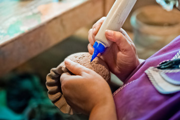 Pottery production. How to make clay products, jugs, pots, vases. Clay workshop. Painting and modeling of clay products