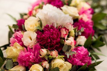 Wedding peony bouquet on table