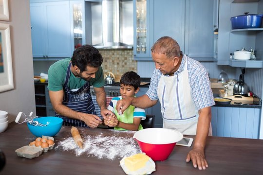 High angle view of family preparing food