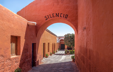 Santa Catalina Monastery with the word SILENCE written on the arch - Arequipa, Peru