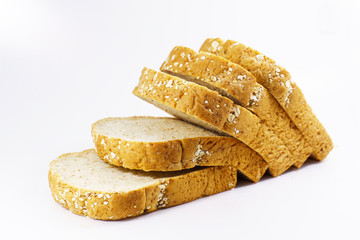 slices of whole wheat bread isolated on white background.