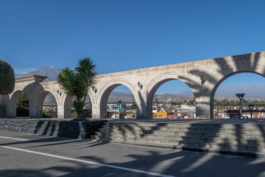 The Arches of Yanahuara Plaza and Misti Volcano on Background - written on the arches are quotes of famous people of the city - Arequipa, Peru