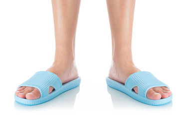 Woman feet wearing beautiful blue sandal standing with front view on white background, Fashion...