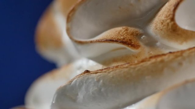 Whipped cream. White cream on the cake closeup