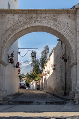 Arch with a quote from a famous arequipan citizen and Street of Yanahuara - Arequipa, Peru