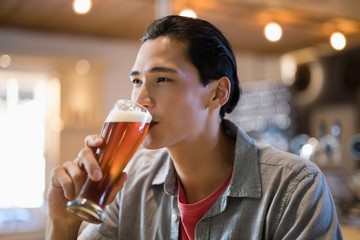 Man having beer in a restaurant