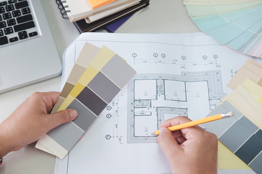 Architect or  Interior designer selects color tones for house project