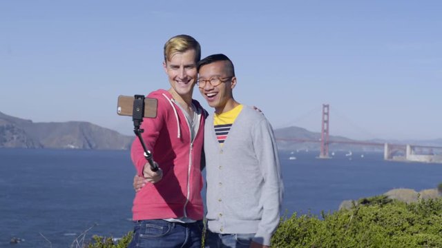 Gay Couple Use Selfie Stick To Take Photos With Golden Gate Bridge In Background