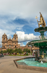 Plaza de Armas with Inca Fountain and Compania de Jesus Church - Cusco, Peru
