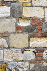 Background of an old stone brick wall shot close-up 