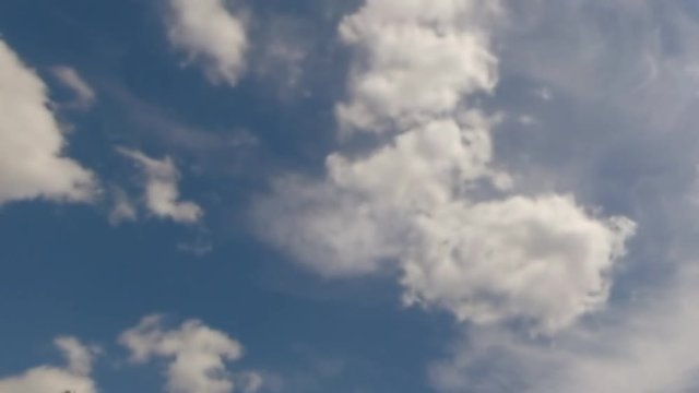 Time Lapse of Very Fast Moving Clouds On A Blue Summer Sky
