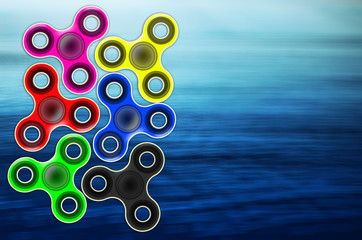 A lot of spinners on a blue sea background, decay, beautiful