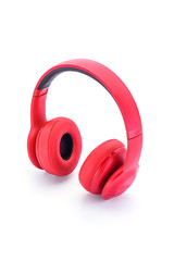 Red bluetooth earphones isolated on white background